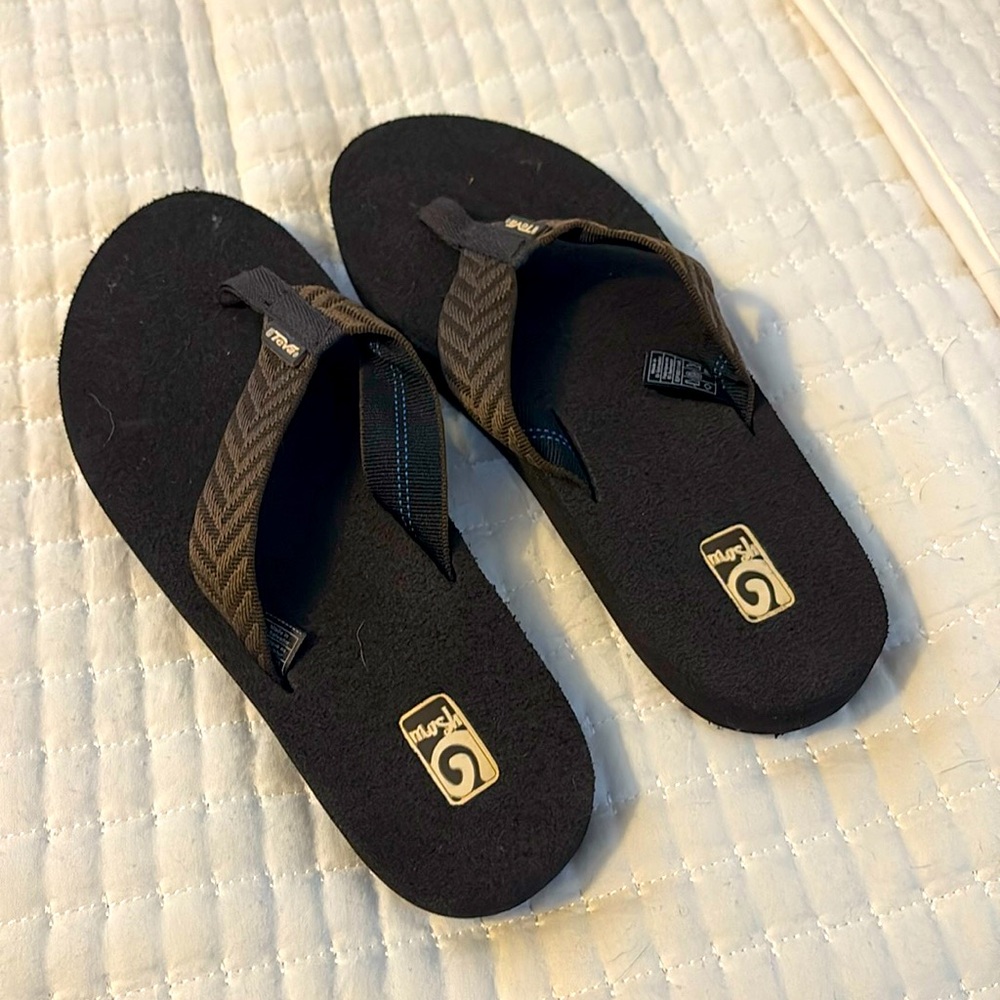 Brown Teva mush flip flops